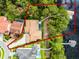 Aerial shot outlining property lines of home with pool, dock access, and lake views at 10122 Royal Island Ct, Orlando, FL 32836