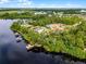 Aerial view of waterfront neighborhood with private boat docks offering lake access at 10122 Royal Island Ct, Orlando, FL 32836