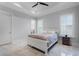 Neutral bedroom featuring shutters, ceiling fan, and carpeted floors at 10122 Royal Island Ct, Orlando, FL 32836