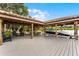 Spacious covered boat dock with lifts and seating offers easy access to water activities at 10122 Royal Island Ct, Orlando, FL 32836