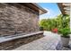 Private courtyard featuring a custom water feature and a cozy seating area at 10122 Royal Island Ct, Orlando, FL 32836