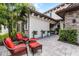 Exterior space featuring outdoor seating with potted plants at 10122 Royal Island Ct, Orlando, FL 32836