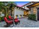 Exterior space featuring outdoor seating with potted plants at 10122 Royal Island Ct, Orlando, FL 32836
