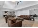 Open-concept living room seamlessly connecting to the kitchen and dining area, great for gatherings and everyday living at 10122 Royal Island Ct, Orlando, FL 32836