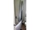 Compact bathroom with standard white tub, tiled walls, and basic fixtures at 1022 E 3Rd Ave, Mount Dora, FL 32757