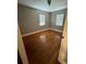 Bedroom with hardwood floors at 1225 E 1St Ave, Mount Dora, FL 32757