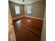 Bedroom with hardwood floors at 1225 E 1St Ave, Mount Dora, FL 32757
