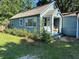 Older home exterior in need of some cosmetic upgrades and improved landscaping at 1225 E 1St Ave, Mount Dora, FL 32757