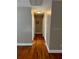 Hallway with hardwood floors at 1225 E 1St Ave, Mount Dora, FL 32757