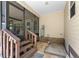 Home's backyard and patio area, with steps up to the patio at 1303 E Schwartz Blvd, Lady Lake, FL 32159