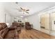 Spacious living room with wood floors and lots of natural lighting at 1303 E Schwartz Blvd, Lady Lake, FL 32159