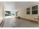A covered outdoor patio offers a comfortable and shaded retreat with ample space at 1303 E Schwartz Blvd, Lady Lake, FL 32159