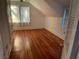 An inviting bedroom with hardwood floors and natural light, creating a peaceful and comfortable retreat at 148 W 9Th Ave, Mount Dora, FL 32757