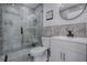 Elegant bathroom featuring a glass-enclosed shower, modern vanity, and sleek fixtures at 17009 Se 96Th Chapelwood Cir, The Villages, FL 32162