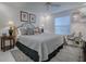 Comfortable bedroom with a cozy bed, soft lighting, and stylish decor at 17009 Se 96Th Chapelwood Cir, The Villages, FL 32162