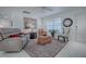 Cozy living room with modern furniture, light walls, and an airy atmosphere at 17009 Se 96Th Chapelwood Cir, The Villages, FL 32162