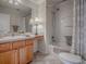 Well-appointed bathroom with a tub-shower combination, vanity with sink, and stylish decor at 1701 Lakewood Dr, The Villages, FL 32162