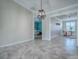 Bright open floorplan with views of the dining area and bedroom creating a versatile space to enjoy at 1701 Lakewood Dr, The Villages, FL 32162
