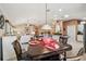 Comfortable dining area that leads into the living room at 17108 Se 76Th Creekside Cir, The Villages, FL 32162