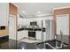 Spacious kitchen with stainless steel appliances, granite countertops, and ample white cabinetry at 17108 Se 76Th Creekside Cir, The Villages, FL 32162