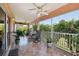 Enjoy the outdoors on this large screened patio with ceiling fans at 17108 Se 76Th Creekside Cir, The Villages, FL 32162