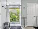 Elegant bathroom featuring tiled walk-in shower with garden view at 1930 Country Club Rd, Eustis, FL 32726