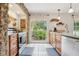 Beautiful kitchen with stainless steel appliances, lots of counter space, and natural light at 1930 Country Club Rd, Eustis, FL 32726