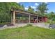 Open barn door with tractor at 19703 Lake Lincoln Ln, Eustis, FL 32736