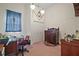 Bedroom featuring a double door closet, desk, and closet with overhead lighting at 19703 Lake Lincoln Ln, Eustis, FL 32736
