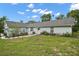 Single-story home with a well-maintained yard and a peaceful setting at 19703 Lake Lincoln Ln, Eustis, FL 32736