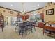 Bright, spacious kitchen with large island, tile floors, and ample counter space at 19703 Lake Lincoln Ln, Eustis, FL 32736
