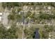 An aerial view of a neighborhood lot, conveniently located across the street from a scenic pond at 2001 Bates Ave, Eustis, FL 32726
