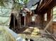 Damaged interior with exposed framing and roof damage at 2001 Bates Ave, Eustis, FL 32726