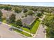 Beautiful aerial view of a home in a quiet neighborhood with mature trees and well-maintained lawns at 2064 Rafton Rd, Apopka, FL 32703