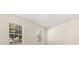 Bright bedroom featuring neutral walls, large windows and tree views at 2064 Rafton Rd, Apopka, FL 32703