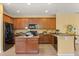 Well-equipped kitchen featuring stainless steel appliances, granite countertops, and ample cabinet space at 2064 Rafton Rd, Apopka, FL 32703