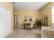 The office area with desk setup features carpet flooring and natural light at 2064 Rafton Rd, Apopka, FL 32703