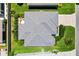 Aerial view of a gray roof on a lush green lot at 2160 Biller Cir, The Villages, FL 32163