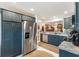 Spacious kitchen with stainless steel appliances, granite countertops, and ample cabinet storage at 2160 Biller Cir, The Villages, FL 32163