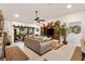 Bright living room with a ceiling fan, decorative wall art, and a comfortable seating area at 2160 Biller Cir, The Villages, FL 32163