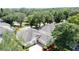 Aerial view of the home with mature trees at 2415 Twickingham Ct, Clermont, FL 34711