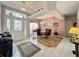 Inviting entryway leading to a dining area with wood floors and stylish decor at 2415 Twickingham Ct, Clermont, FL 34711