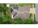 Aerial view of a roof with solar panels at 2424 Plumadore Dr, Grand Island, FL 32735