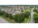Community aerial view showcasing the residential area and some of the homes at 2424 Plumadore Dr, Grand Island, FL 32735