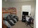 bedroom featuring a bunk bed and a window at 2501 Sheridan Rd, Mount Dora, FL 32757