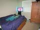 Bedroom with a bed, closet and dresser at 2501 Sheridan Rd, Mount Dora, FL 32757