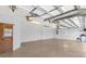 The garage has two bays, painted flooring and a utility sink at 2568 Jupiter Way, The Villages, FL 32163