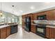 Well-equipped kitchen featuring modern appliances, ample cabinet space, and a functional layout at 2568 Jupiter Way, The Villages, FL 32163