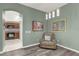 Cozy sitting area featuring accent lighting and view of the kitchen area at 2568 Jupiter Way, The Villages, FL 32163