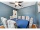Charming dining room complete with ceiling fan and seating for eight guests at 26822 Bull Run, Leesburg, FL 34748